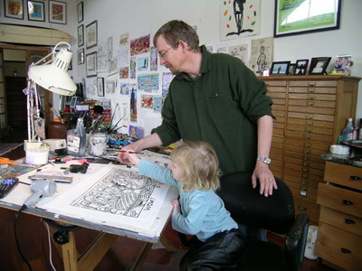 Robert Neubecker working in his studio