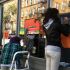 Students-painting-jersey-city-business-windows-for-halloween thumbnail